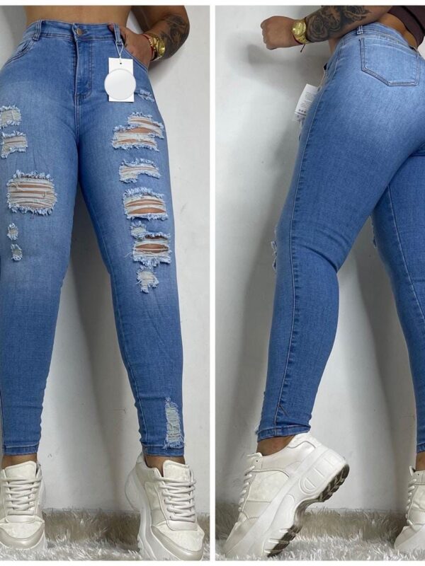 Jean push up bota tubo con bolsillos y rotos