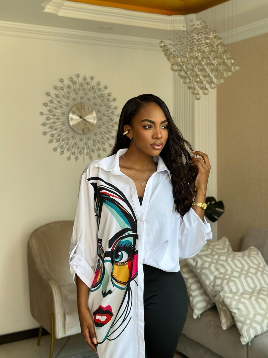 Long blouse with women's face print, one size fits most.