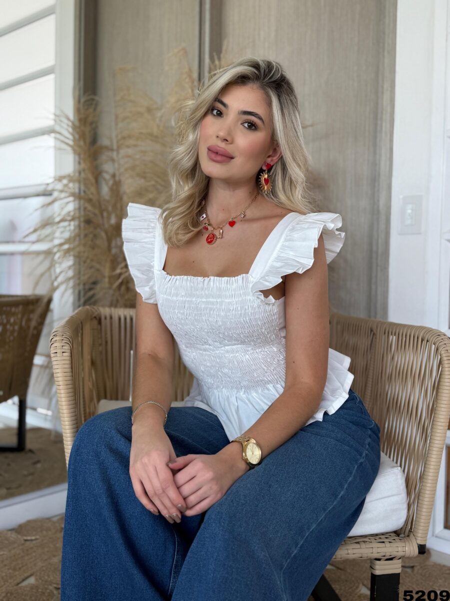 Blusa con resorte y hombros con bolero - Image 3